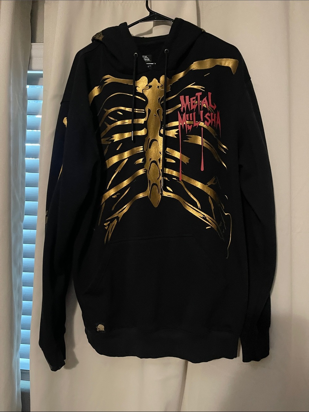 Metal Mulisha Black Hoodie with Gold Ribcage and Pink Logo